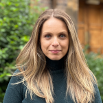 headshot of Dr Lisa-Maria Needham