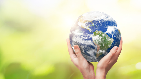 hands holding globe