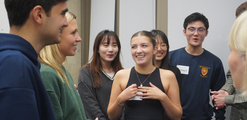 Students from the MPhil in Biological Sciences taking and laughing