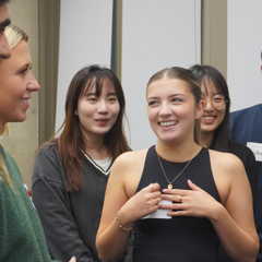 Students from the MPhil in Biological Sciences taking and laughing
