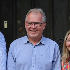 Professor Tim Dalgleish with Peter and Christina Dawson. Credit: St Catherine's College