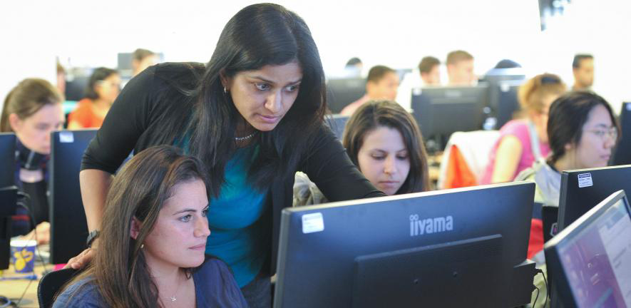 Bioinformatics Training Facility people looking at computer screen